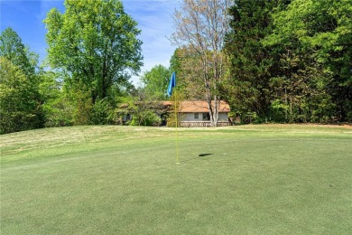 This charming home on the 1st green at Chickasaw Point golf on The Trail At Chickasaw Pointe in South Carolina - for sale on GolfHomes.com, golf home, golf lot