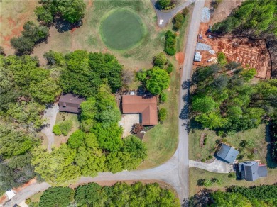 This charming home on the 1st green at Chickasaw Point golf on The Trail At Chickasaw Pointe in South Carolina - for sale on GolfHomes.com, golf home, golf lot
