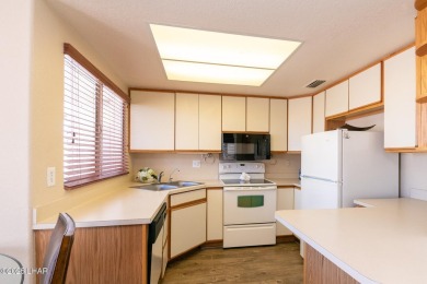 This fully furnished 2 bed, 3 bath condo is perfectly positioned on London Bridge Golf Course in Arizona - for sale on GolfHomes.com, golf home, golf lot