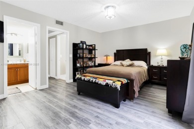 WELCOME TO YOUR BEAUTIFUL CONDO IN CENTURY VILLAGE PINES ACTIVE on Flamingo Lakes Country Club in Florida - for sale on GolfHomes.com, golf home, golf lot