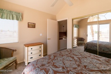 This fully furnished 2 bed, 3 bath condo is perfectly positioned on London Bridge Golf Course in Arizona - for sale on GolfHomes.com, golf home, golf lot
