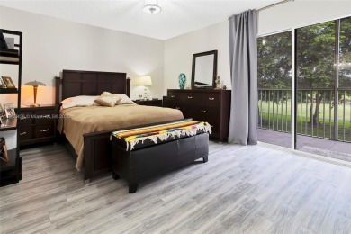 WELCOME TO YOUR BEAUTIFUL CONDO IN CENTURY VILLAGE PINES ACTIVE on Flamingo Lakes Country Club in Florida - for sale on GolfHomes.com, golf home, golf lot