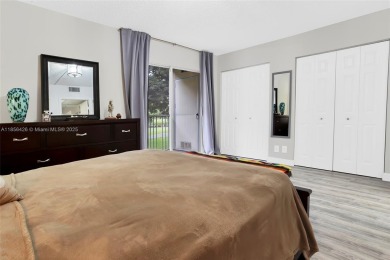 WELCOME TO YOUR BEAUTIFUL CONDO IN CENTURY VILLAGE PINES ACTIVE on Flamingo Lakes Country Club in Florida - for sale on GolfHomes.com, golf home, golf lot
