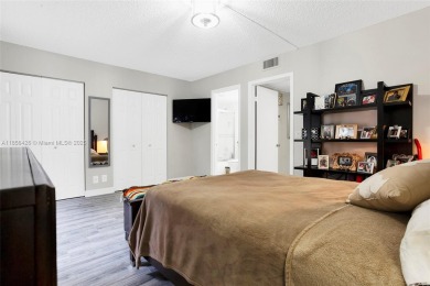 WELCOME TO YOUR BEAUTIFUL CONDO IN CENTURY VILLAGE PINES ACTIVE on Flamingo Lakes Country Club in Florida - for sale on GolfHomes.com, golf home, golf lot
