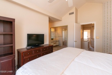 This fully furnished 2 bed, 3 bath condo is perfectly positioned on London Bridge Golf Course in Arizona - for sale on GolfHomes.com, golf home, golf lot
