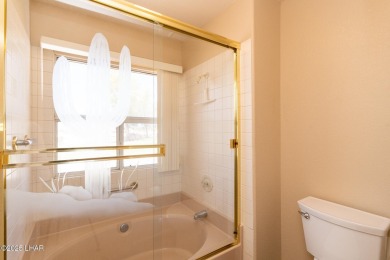 This fully furnished 2 bed, 3 bath condo is perfectly positioned on London Bridge Golf Course in Arizona - for sale on GolfHomes.com, golf home, golf lot