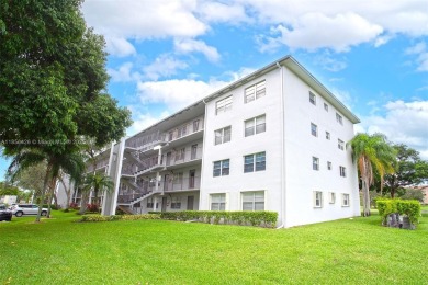 WELCOME TO YOUR BEAUTIFUL CONDO IN CENTURY VILLAGE PINES ACTIVE on Flamingo Lakes Country Club in Florida - for sale on GolfHomes.com, golf home, golf lot
