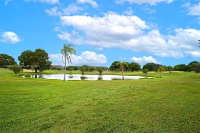 WELCOME TO YOUR BEAUTIFUL CONDO IN CENTURY VILLAGE PINES ACTIVE on Flamingo Lakes Country Club in Florida - for sale on GolfHomes.com, golf home, golf lot