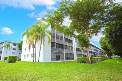 WELCOME TO YOUR BEAUTIFUL CONDO IN CENTURY VILLAGE PINES ACTIVE on Flamingo Lakes Country Club in Florida - for sale on GolfHomes.com, golf home, golf lot