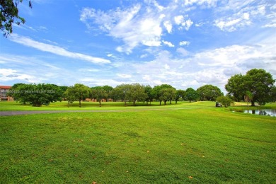 WELCOME TO YOUR BEAUTIFUL CONDO IN CENTURY VILLAGE PINES ACTIVE on Flamingo Lakes Country Club in Florida - for sale on GolfHomes.com, golf home, golf lot