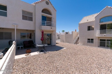 This fully furnished 2 bed, 3 bath condo is perfectly positioned on London Bridge Golf Course in Arizona - for sale on GolfHomes.com, golf home, golf lot