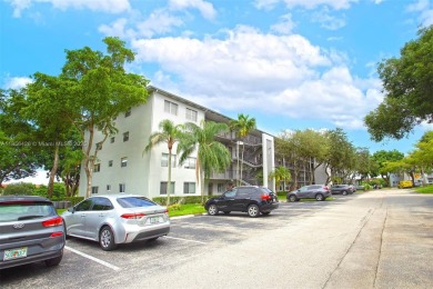 WELCOME TO YOUR BEAUTIFUL CONDO IN CENTURY VILLAGE PINES ACTIVE on Flamingo Lakes Country Club in Florida - for sale on GolfHomes.com, golf home, golf lot