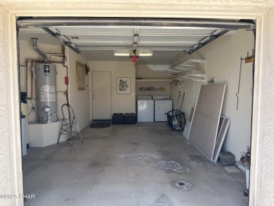 This fully furnished 2 bed, 3 bath condo is perfectly positioned on London Bridge Golf Course in Arizona - for sale on GolfHomes.com, golf home, golf lot
