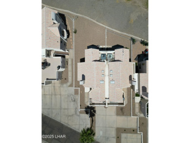 This fully furnished 2 bed, 3 bath condo is perfectly positioned on London Bridge Golf Course in Arizona - for sale on GolfHomes.com, golf home, golf lot