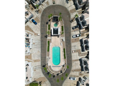 This fully furnished 2 bed, 3 bath condo is perfectly positioned on London Bridge Golf Course in Arizona - for sale on GolfHomes.com, golf home, golf lot