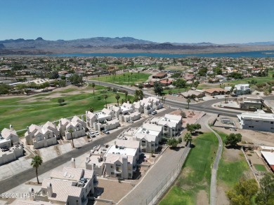 This fully furnished 2 bed, 3 bath condo is perfectly positioned on London Bridge Golf Course in Arizona - for sale on GolfHomes.com, golf home, golf lot