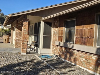 Well-maintained block home on a corner lot in a cul-de-sac on Country Meadows Golf Club in Arizona - for sale on GolfHomes.com, golf home, golf lot