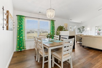 Stunning, move-in-ready home with vaulted ceilings is on The Links at Carillon in Illinois - for sale on GolfHomes.com, golf home, golf lot