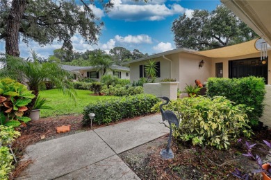 This home is a Head Turner, You are welcomed by the grand double on Palm Aire Country Club of Sarasota in Florida - for sale on GolfHomes.com, golf home, golf lot