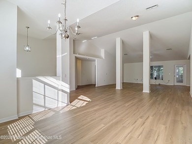 Welcome to this beautifully updated 4-bedroom, 3-bath home on Southern Woods Golf Club in Florida - for sale on GolfHomes.com, golf home, golf lot