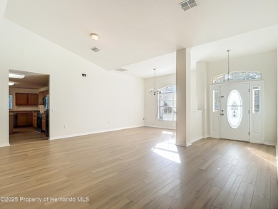 Welcome to this beautifully updated 4-bedroom, 3-bath home on Southern Woods Golf Club in Florida - for sale on GolfHomes.com, golf home, golf lot