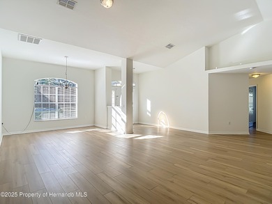 Welcome to this beautifully updated 4-bedroom, 3-bath home on Southern Woods Golf Club in Florida - for sale on GolfHomes.com, golf home, golf lot