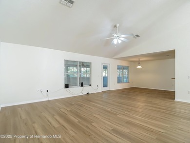 Welcome to this beautifully updated 4-bedroom, 3-bath home on Southern Woods Golf Club in Florida - for sale on GolfHomes.com, golf home, golf lot