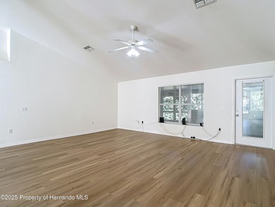 Welcome to this beautifully updated 4-bedroom, 3-bath home on Southern Woods Golf Club in Florida - for sale on GolfHomes.com, golf home, golf lot