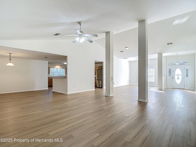 Welcome to this beautifully updated 4-bedroom, 3-bath home on Southern Woods Golf Club in Florida - for sale on GolfHomes.com, golf home, golf lot