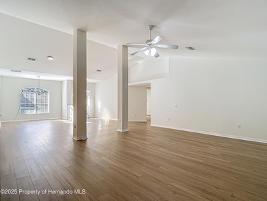 Welcome to this beautifully updated 4-bedroom, 3-bath home on Southern Woods Golf Club in Florida - for sale on GolfHomes.com, golf home, golf lot