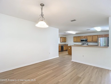 Welcome to this beautifully updated 4-bedroom, 3-bath home on Southern Woods Golf Club in Florida - for sale on GolfHomes.com, golf home, golf lot