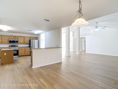 Welcome to this beautifully updated 4-bedroom, 3-bath home on Southern Woods Golf Club in Florida - for sale on GolfHomes.com, golf home, golf lot