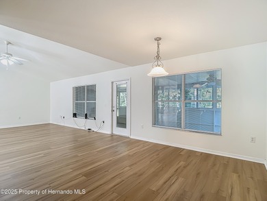 Welcome to this beautifully updated 4-bedroom, 3-bath home on Southern Woods Golf Club in Florida - for sale on GolfHomes.com, golf home, golf lot