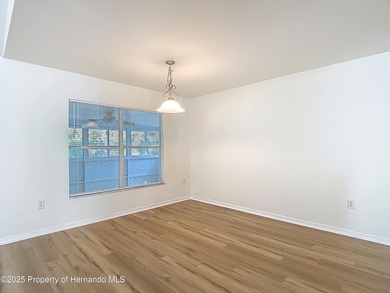 Welcome to this beautifully updated 4-bedroom, 3-bath home on Southern Woods Golf Club in Florida - for sale on GolfHomes.com, golf home, golf lot