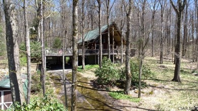 Nestled in the heart of the Laurel Highlands, this 3-bedroom on Kings Mountain Golf Course in Pennsylvania - for sale on GolfHomes.com, golf home, golf lot