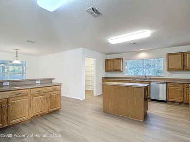 Welcome to this beautifully updated 4-bedroom, 3-bath home on Southern Woods Golf Club in Florida - for sale on GolfHomes.com, golf home, golf lot