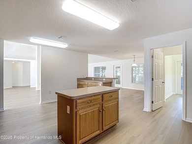 Welcome to this beautifully updated 4-bedroom, 3-bath home on Southern Woods Golf Club in Florida - for sale on GolfHomes.com, golf home, golf lot