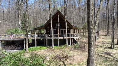 Nestled in the heart of the Laurel Highlands, this 3-bedroom on Kings Mountain Golf Course in Pennsylvania - for sale on GolfHomes.com, golf home, golf lot