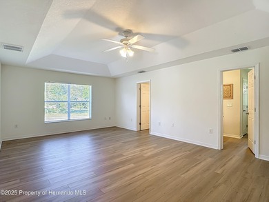 Welcome to this beautifully updated 4-bedroom, 3-bath home on Southern Woods Golf Club in Florida - for sale on GolfHomes.com, golf home, golf lot