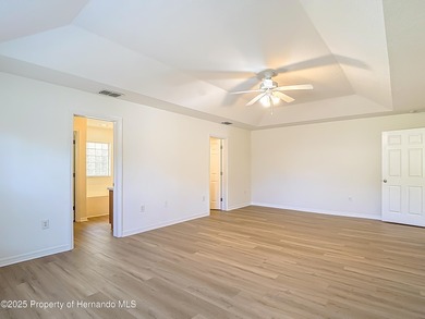 Welcome to this beautifully updated 4-bedroom, 3-bath home on Southern Woods Golf Club in Florida - for sale on GolfHomes.com, golf home, golf lot