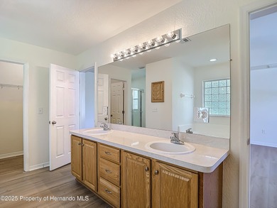 Welcome to this beautifully updated 4-bedroom, 3-bath home on Southern Woods Golf Club in Florida - for sale on GolfHomes.com, golf home, golf lot