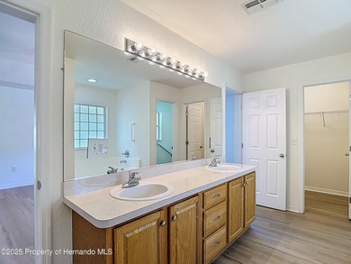 Welcome to this beautifully updated 4-bedroom, 3-bath home on Southern Woods Golf Club in Florida - for sale on GolfHomes.com, golf home, golf lot