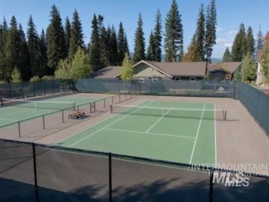 Breath taking mountain views from large, cov back patio on McCall Municipal Golf Course in Idaho - for sale on GolfHomes.com, golf home, golf lot