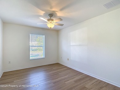 Welcome to this beautifully updated 4-bedroom, 3-bath home on Southern Woods Golf Club in Florida - for sale on GolfHomes.com, golf home, golf lot