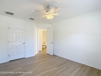 Welcome to this beautifully updated 4-bedroom, 3-bath home on Southern Woods Golf Club in Florida - for sale on GolfHomes.com, golf home, golf lot