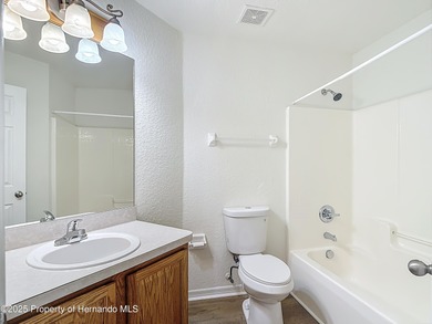 Welcome to this beautifully updated 4-bedroom, 3-bath home on Southern Woods Golf Club in Florida - for sale on GolfHomes.com, golf home, golf lot