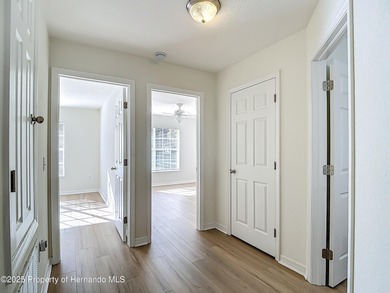 Welcome to this beautifully updated 4-bedroom, 3-bath home on Southern Woods Golf Club in Florida - for sale on GolfHomes.com, golf home, golf lot