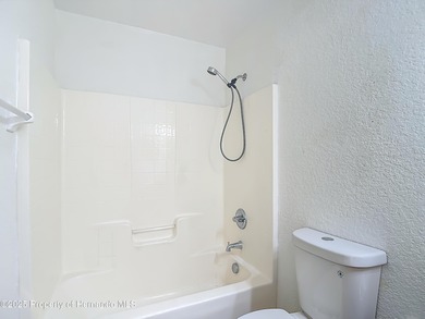 Welcome to this beautifully updated 4-bedroom, 3-bath home on Southern Woods Golf Club in Florida - for sale on GolfHomes.com, golf home, golf lot