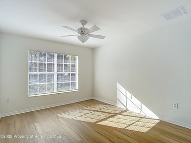 Welcome to this beautifully updated 4-bedroom, 3-bath home on Southern Woods Golf Club in Florida - for sale on GolfHomes.com, golf home, golf lot