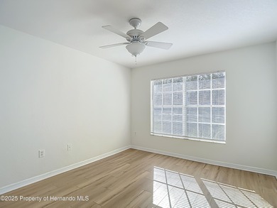 Welcome to this beautifully updated 4-bedroom, 3-bath home on Southern Woods Golf Club in Florida - for sale on GolfHomes.com, golf home, golf lot